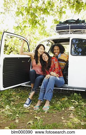 Multi-ethnic group of friends on camping trip View Large Photo Image Stock Image - Multi-ethnic group of friends on camping trip. Fotosearch