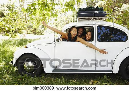Multi-ethnic group of friends on camping trip View Large Photo Image Stock Photo - Multi-ethnic group of friends on camping trip. Fotosearch