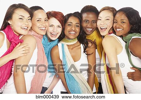 Multi-ethnic women hugging View Large Photo Image Stock Photo - Multi-ethnic women hugging. Fotosearch