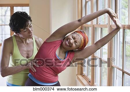 Multi-ethnic women in yoga class View Large Photo Image Picture - Multi-ethnic women in yoga class. Fotosearch