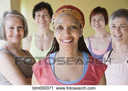 Multi-ethnic women smiling View Large Photo Image Stock Image - Multi-ethnic women smiling. Fotosearch