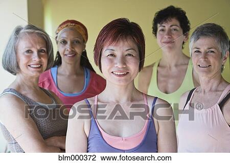 Stock Image - Multi-ethnic women smiling. Fotosearch