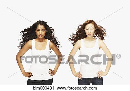 Multi-ethnic women with hands on hips View Large Photo Image Stock Image - Multi-ethnic women with hands on hips. Fotosearch