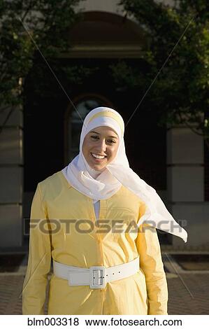 Stock Photo - Muslim teenager smiling. Fotosearch