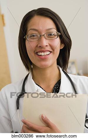 Stock Photograph - Native American doctor smiling. Fotosearch