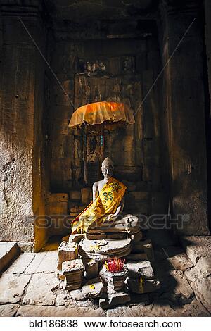 Offerings at shrine in Angkor Wat, Siem Reap, Cambodia View Large Photo Image Stock Photo - Offerings at shrine in Angkor Wat, Siem Reap, Cambodia. Fotosearch