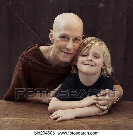 Stock Photography - Older Caucasian cancer survivor with grandson. Fotosearch