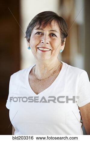 Stock Photograph - Older Hispanic woman smiling. Fotosearch