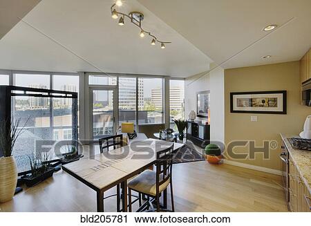 Stock Image - Open floor plan in luxury highrise apartment. Fotosearch