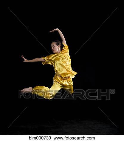 Pacific Islander woman practicing martial arts View Large Photo Image Stock Photo - Pacific Islander woman practicing martial arts. Fotosearch
