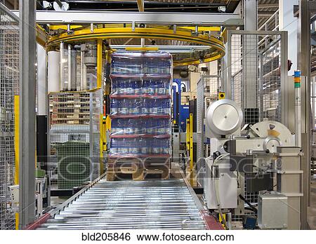 Pallet of bottles on production line in bottling plant View Large Photo Image Stock Photograph - Pallet of bottles on production line in bottling plant. Fotosearch