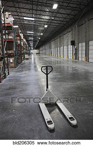 Stock Photography - Pallet truck in warehouse. Fotosearch