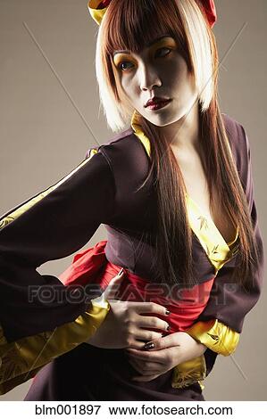 Portrait of Asian woman in traditional clothing View Large Photo Image Stock Photo - Portrait of Asian woman in traditional clothing. Fotosearch