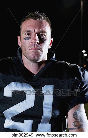 Portrait of football player in uniform View Large Photo Image Stock Photo - Portrait of football player in uniform. Fotosearch