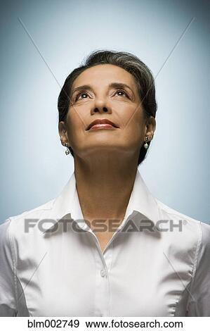 Portrait of Hispanic woman looking up View Large Photo Image Stock Photo - Portrait of Hispanic woman looking up. Fotosearch