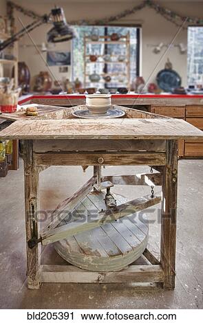 Stock Image - Pottery wheel in studio. Fotosearch
