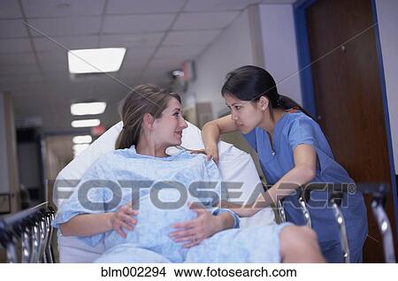 Picture - Pregnant woman in labor at hospital. Fotosearch