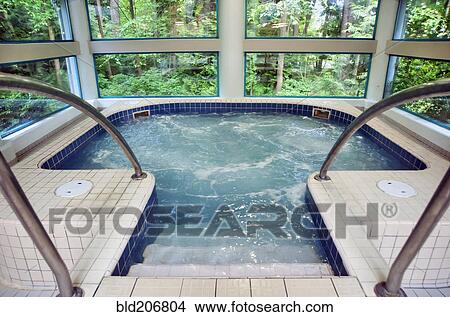 Public whirlpool Jacuzzi with moving water View Large Photo Image Picture - Public whirlpool Jacuzzi with moving water. Fotosearch