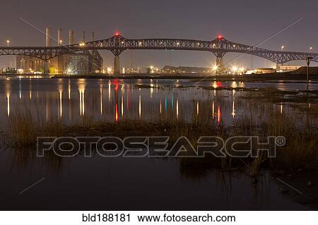 Reflection of illuminated bridge in still lake View Large Photo Image Stock Image - Reflection of illuminated bridge in still lake. Fotosearch