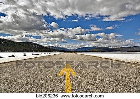 Roadway with an Arrow Painted in the Center View Large Photo Image Stock Photograph - Roadway with an Arrow Painted in the Center. Fotosearch