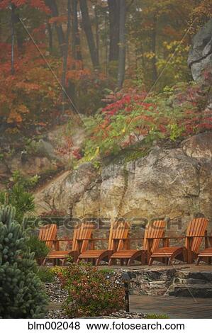 Stock Photo - Row of deck chairs at spa. Fotosearch