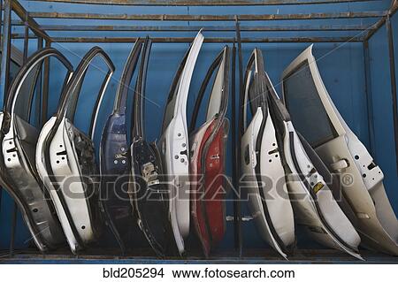 Row of Dismantled Car Doors View Large Photo Image Picture - Row of Dismantled Car Doors. Fotosearch