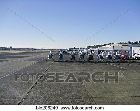 Row of Helicopters View Large Photo Image Stock Photo - Row of Helicopters. Fotosearch
