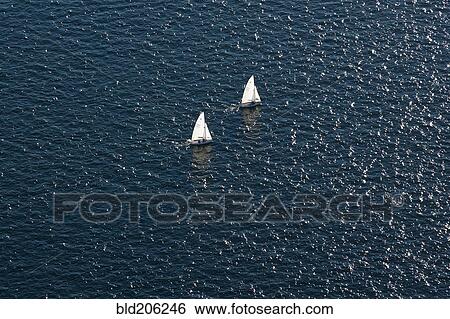 Stock Photograph - Sailboats in the Ocean. Fotosearch