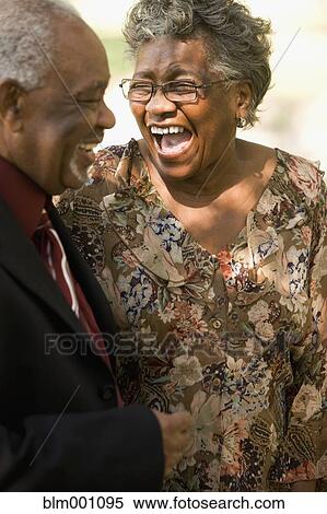 Senior African couple laughing View Large Photo Image Stock Photography - Senior African couple laughing. Fotosearch