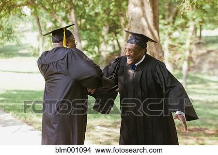 Picture - Senior African men in graduation caps and robes. Fotosearch