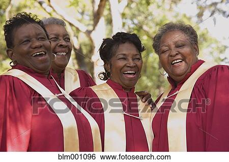 Stock Photograph - Senior African women singing in choir. Fotosearch