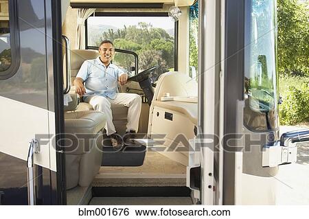 Senior Hispanic man in recreational vehicle View Large Photo Image Stock Photograph - Senior Hispanic man in recreational vehicle. Fotosearch