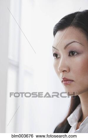 Stock Photograph - Serious Chinese businesswoman. Fotosearch