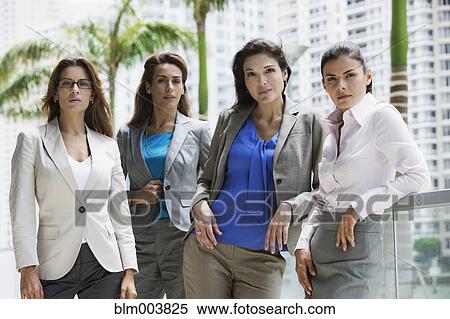 Stock Photography - Serious Hispanic businesswomen. Fotosearch