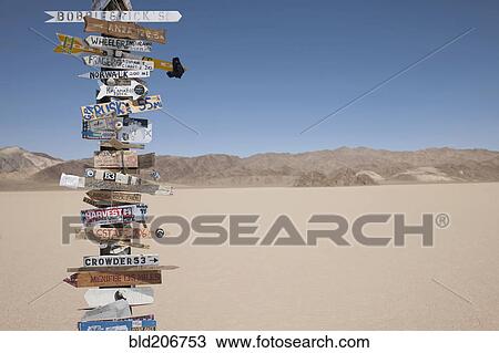 Stock Image - Signpost in desert. Fotosearch