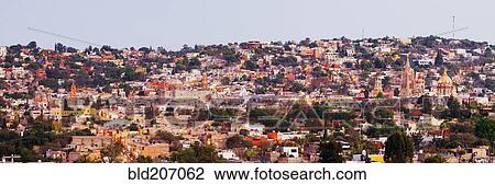 Stock Image - Skyline of San Miguel de Allende at Dusk. Fotosearch