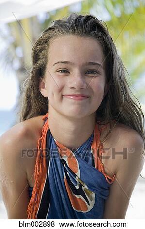 Stock Photo - Smiling girl in sarong. Fotosearch