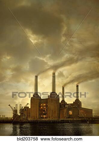 Smoke billowing from factory smokestacks View Large Photo Image Stock Photo - Smoke billowing from factory smokestacks. Fotosearch