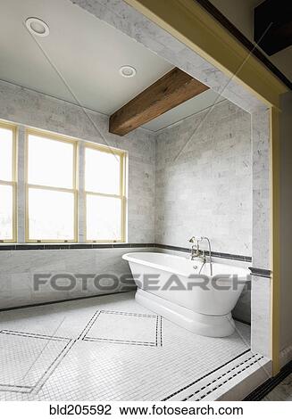 Stock Image - Soaking tub in luxury bathroom. Fotosearch