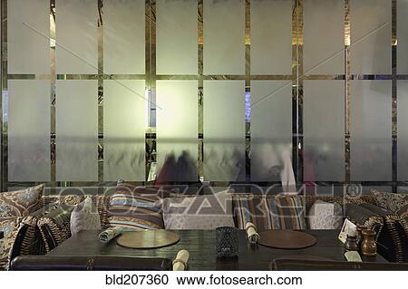 Sofa with many pillows against glass wall in restaurant View Large Photo Image Stock Image - Sofa with many pillows against glass wall in restaurant. Fotosearch