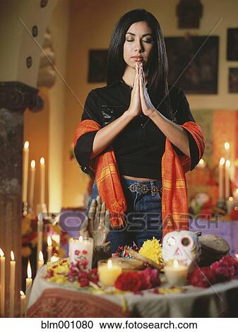 Spanish woman praying View Large Photo Image Stock Image - Spanish woman praying. Fotosearch
