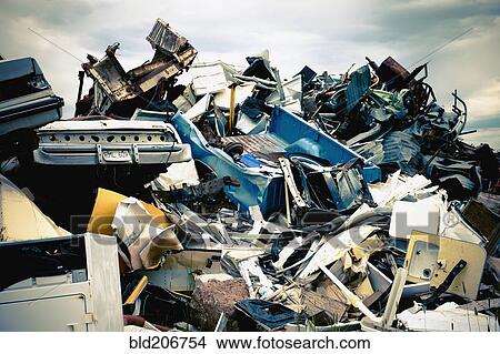 Stacked car parts in junkyard View Large Photo Image Picture - Stacked car parts in junkyard. Fotosearch