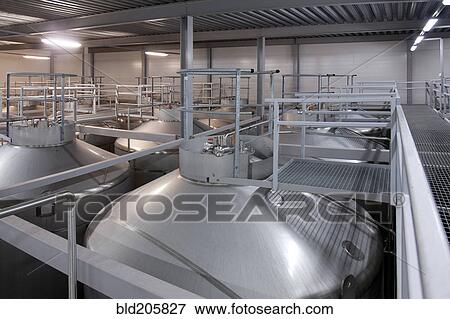Stainless steel vats in factory View Large Photo Image Stock Photo - Stainless steel vats in factory. Fotosearch