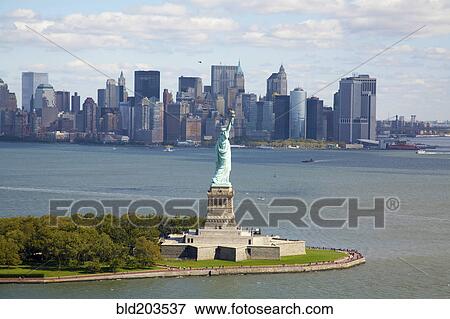 Stock Photo - Statue of Liberty and city skyline, New York, New York, United States. Fotosearch