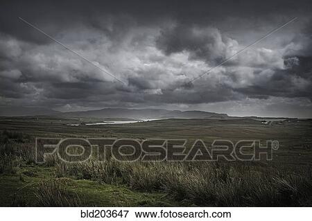 Storm clouds over rural landscape View Large Photo Image Stock Photo - Storm clouds over rural landscape. Fotosearch