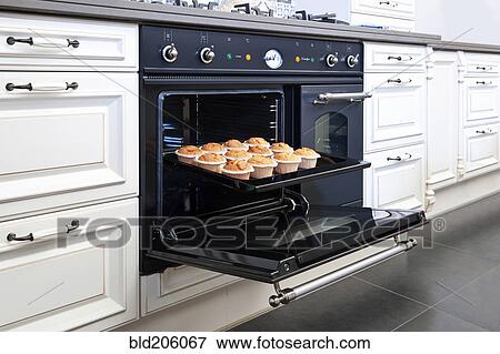 Stylish oven in a modern kitchen View Large Photo Image Stock Photo - Stylish oven in a modern kitchen. Fotosearch