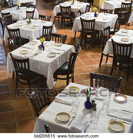 Tables and chairs in empty restaurant View Large Photo Image Stock Photography - Tables and chairs in empty restaurant. Fotosearch