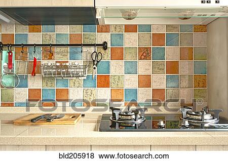 Stock Photo - Tile backsplash behind kitchen stove. Fotosearch