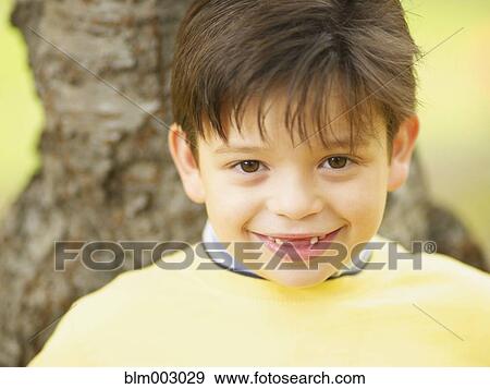 Toothless Hispanic boy smiling View Large Photo Image Stock Photo - Toothless Hispanic boy smiling. Fotosearch