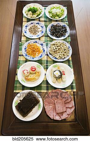 Two Rows of Asian Dishes View Large Photo Image Stock Photography - Two Rows of Asian Dishes. Fotosearch